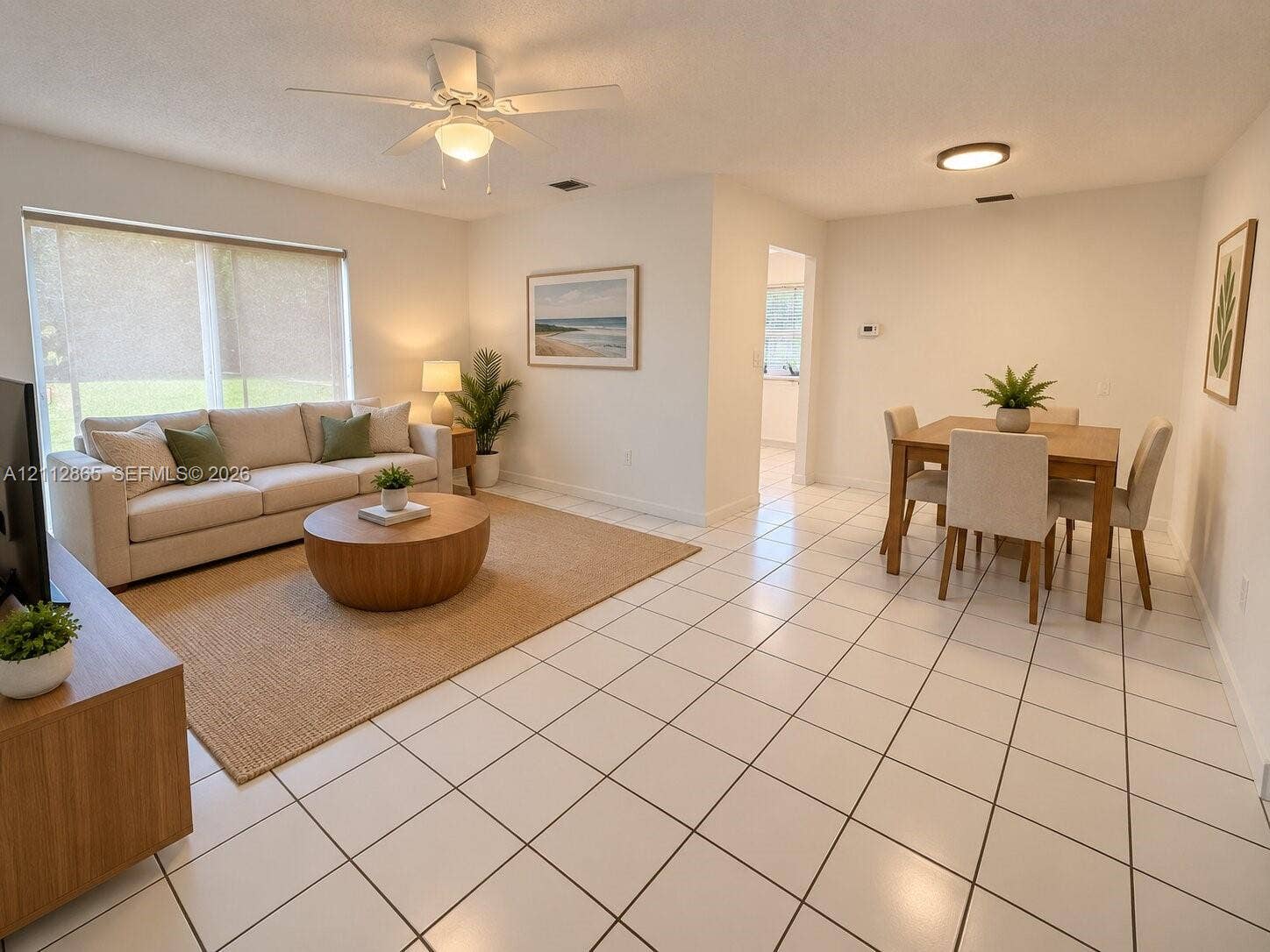 Ceramic tile flooring, white-finish ceiling fan, neutral wall color, and flush-mount lighting