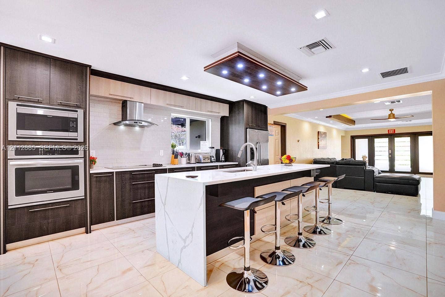 Open Kitchen/w Quartz Kitchen Isle & SS Appliences