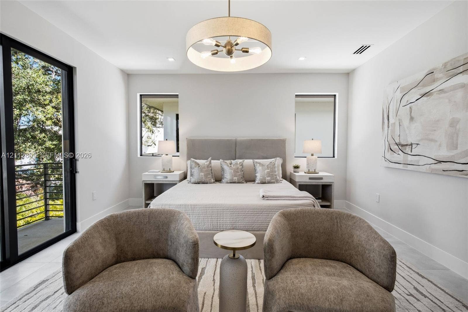 2747 SW 23rd Terrace, Miami, FL 33145 Bedroom featuring large-format tile flooring, a multi-bulb drum pendant light fixture, and black-framed sliding glass doors opening to a balcony