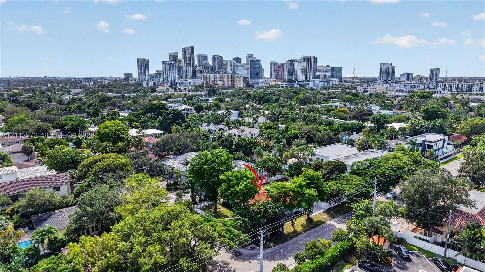 549 NE 12th Avenue, #0, Fort Lauderdale, Fort Lauderdale, FL 33301 Aerial perspective of a residential lot featuring mature canopy trees, proximity to urban infrastructure, and a skyline backdrop