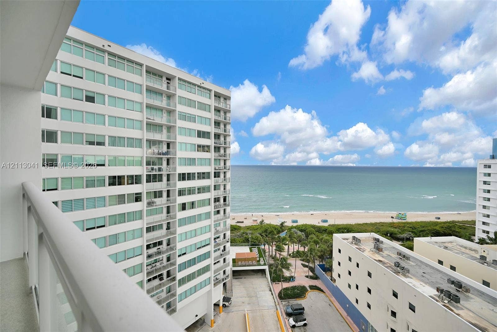 7135 Collins Avenue, #1426, Miami Beach, FL 33141 High-rise balcony featuring metal railings and direct oceanfront scenery