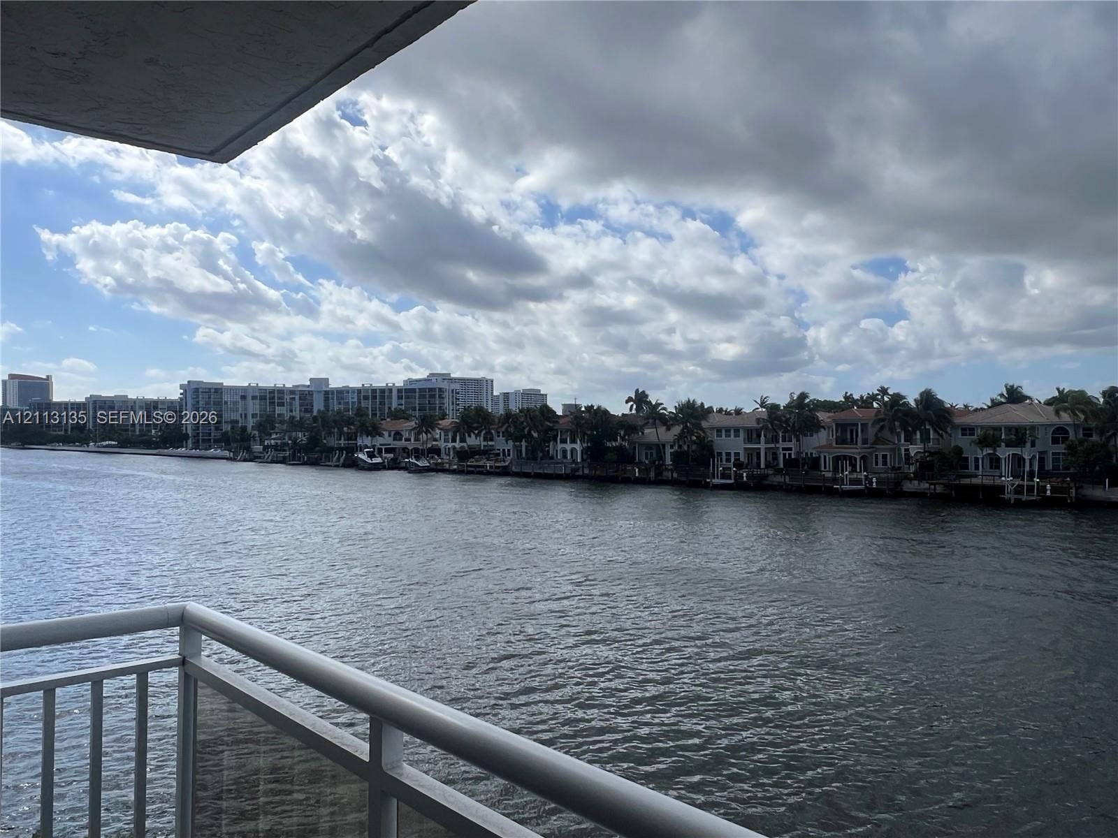 1600 S Ocean Drive, #3A, Hollywood, FL 33019 Waterfront balcony featuring a white metal railing and direct exposure to a waterway