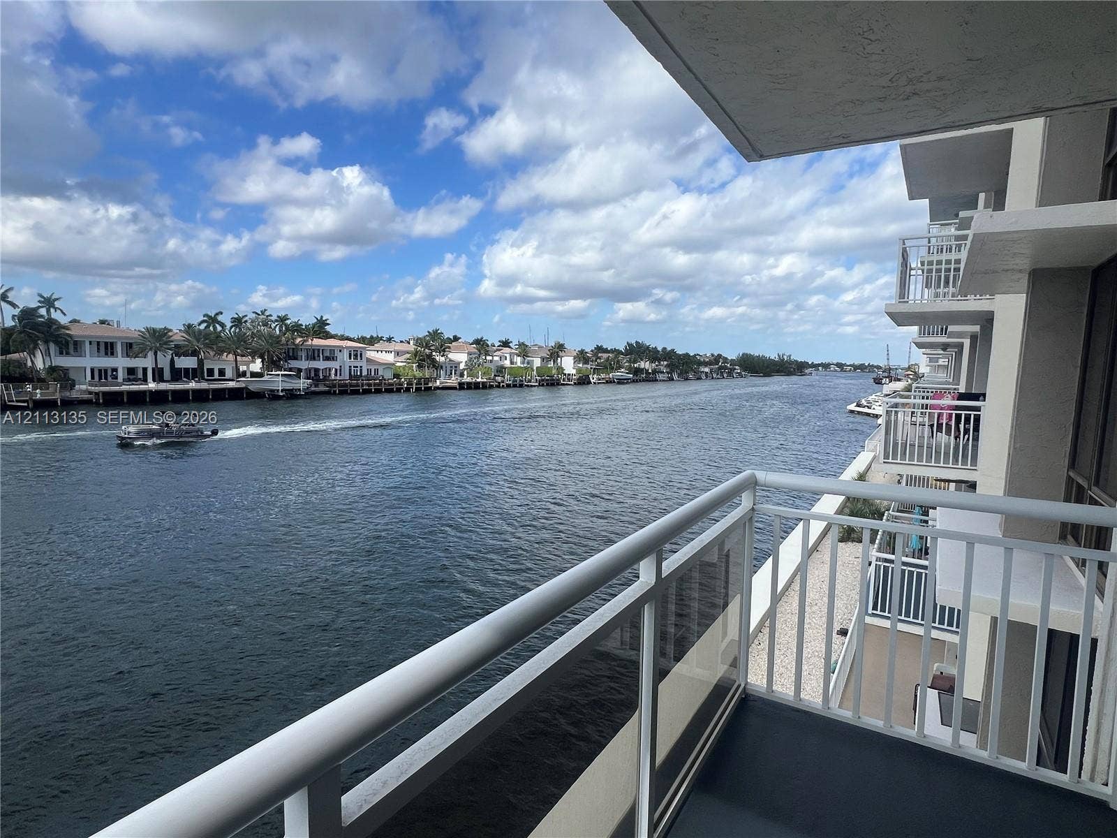 1600 S Ocean Drive, #3A, Hollywood, FL 33019 Covered private balcony featuring glass and metal railings with a direct waterfront exposure