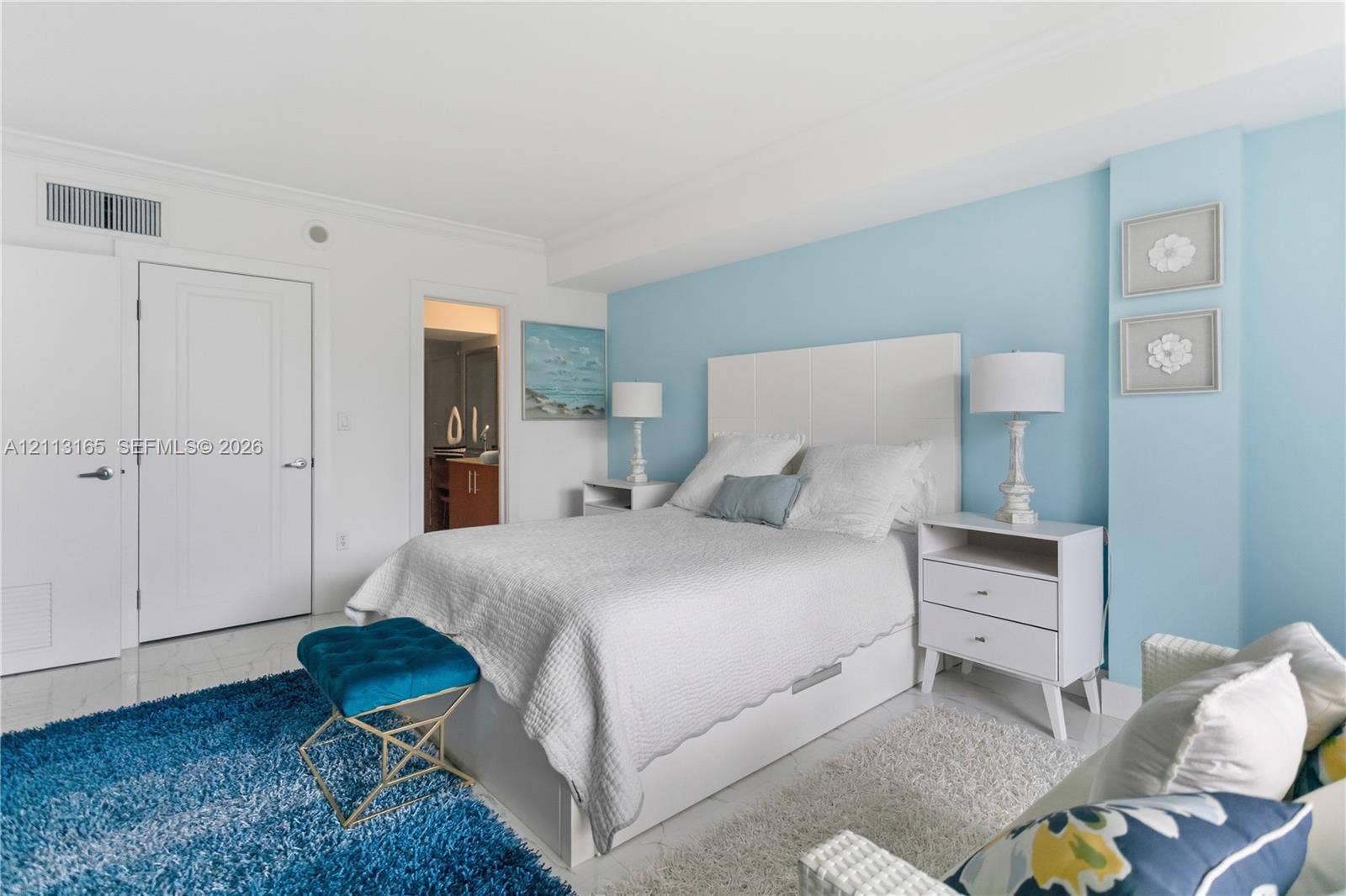 10275 Collins Avenue, #229, Bal Harbour, FL 33154 Room featuring polished tile flooring, smooth ceilings, and solid-core doors