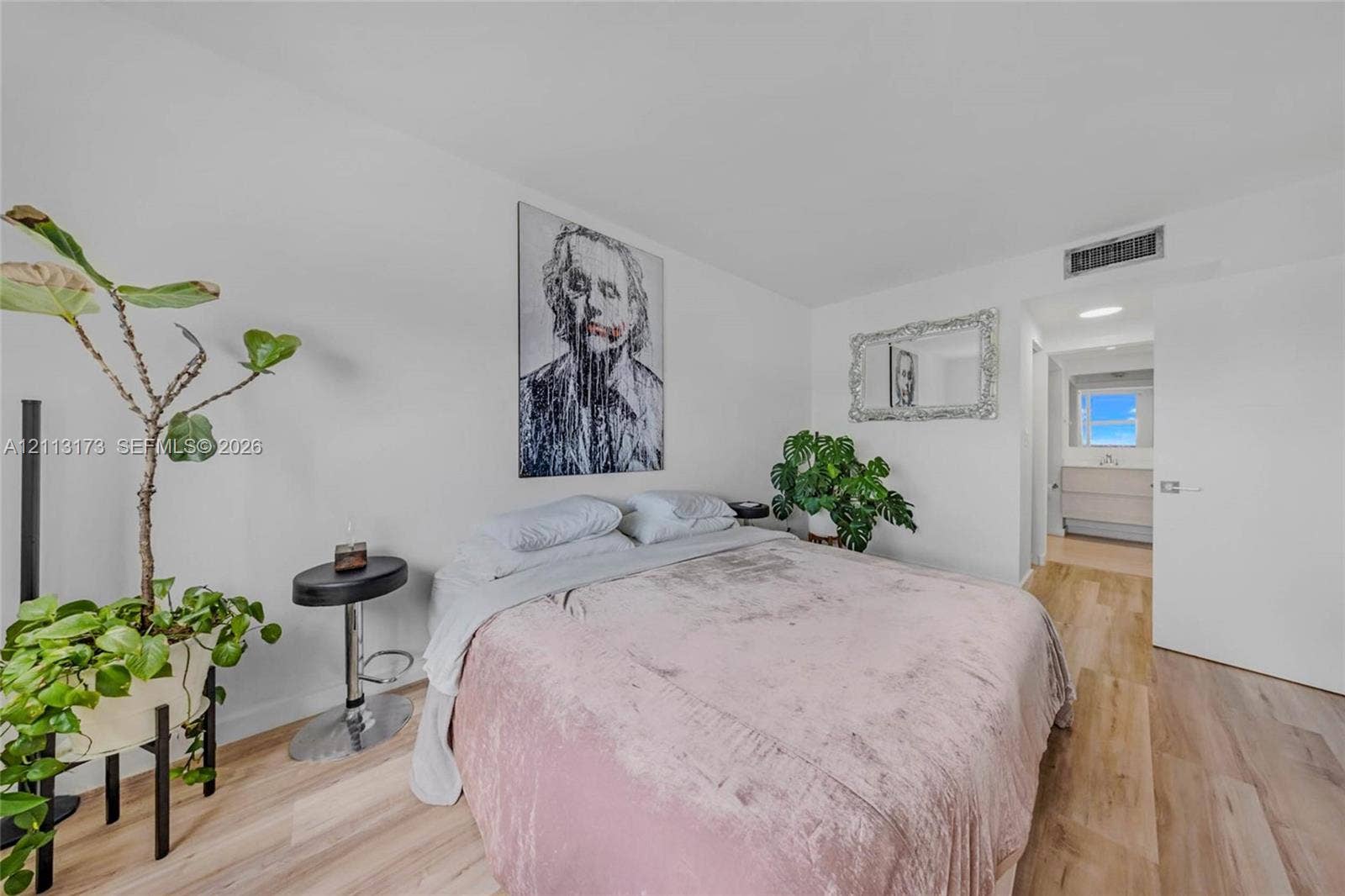 300 Bayview Drive, #1614, Sunny Isles Beach, FL 33160 Neutral wall finishes and light wood-finish flooring