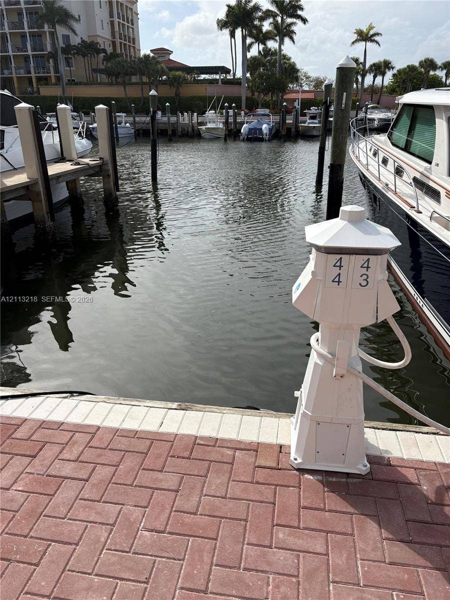 348 S Us Highway 1, #44, Jupiter, Jupiter, FL 33477 Private boat slip with brick-paver docking area, mooring pilings, and dedicated shore power pedestal