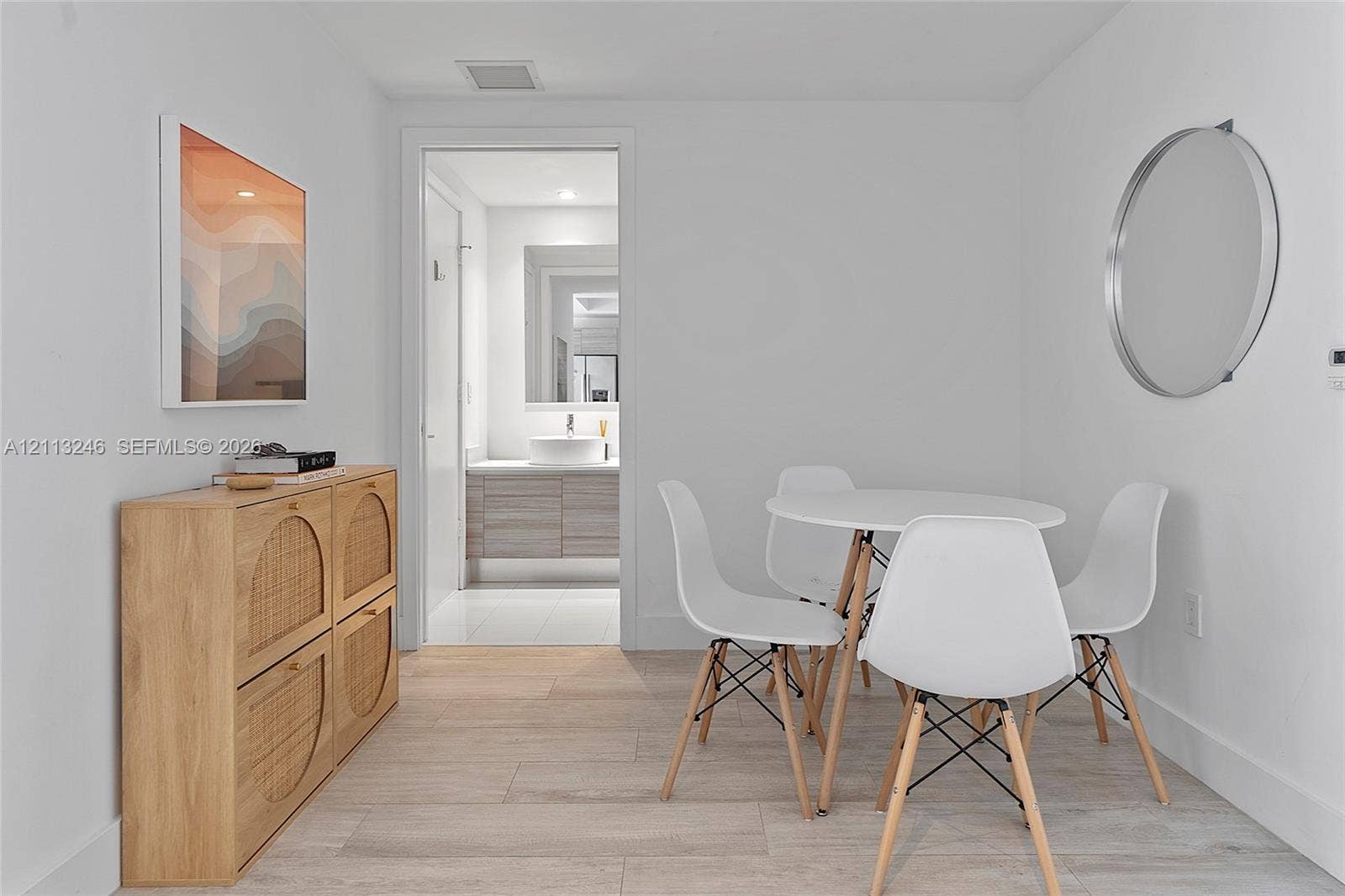 121 NE 34th Street, #2703, Miami, FL 33137 Wood-finish tile flooring and crisp white walls