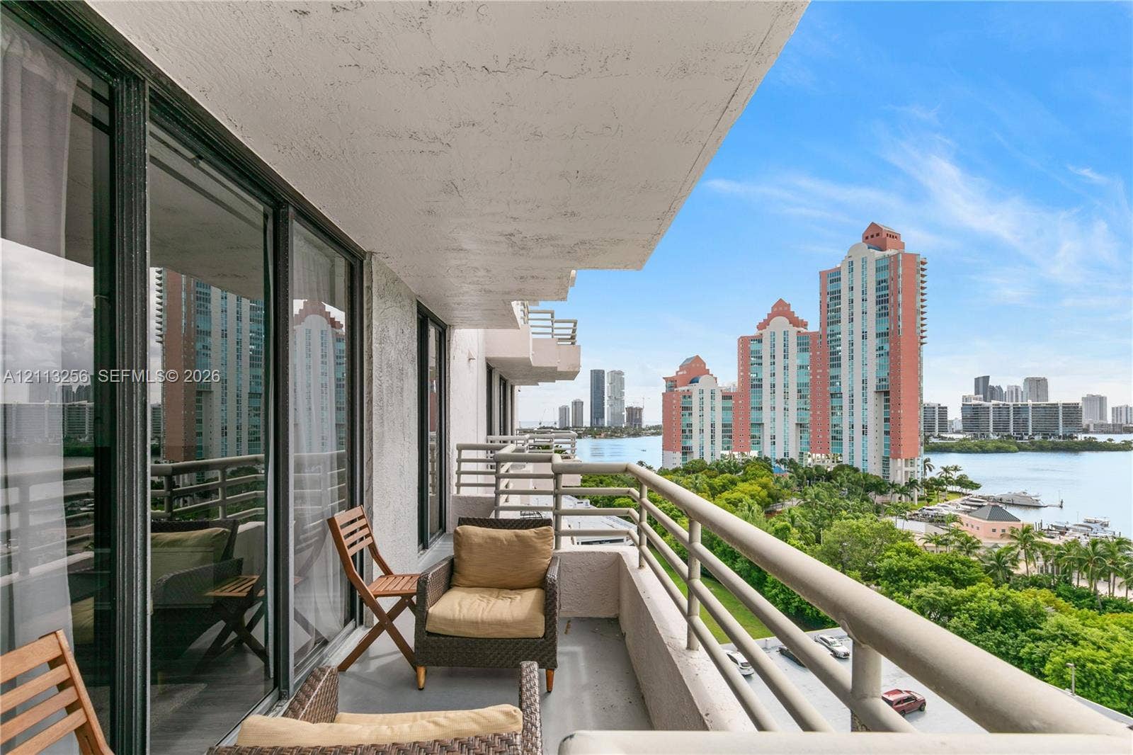 3300 NE 191st Street, #1514, Aventura, FL 33180 Covered oversized balcony featuring expansive ocean, cityscape and intracoastal views