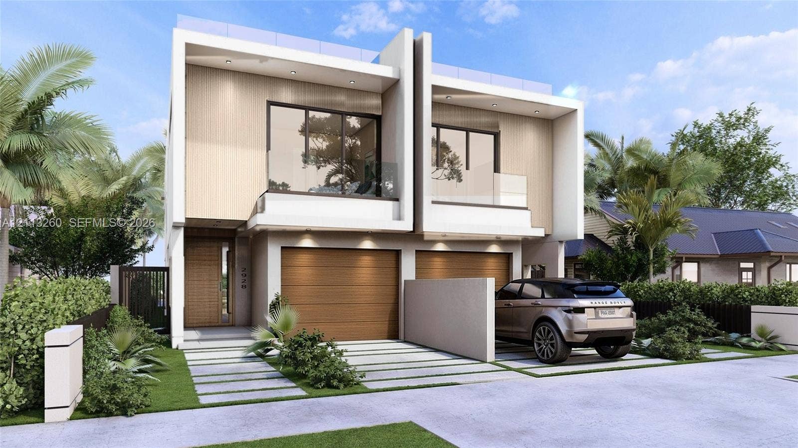 2928 SW 12th Street, Miami, FL 33135 Modern architectural exterior featuring two-tone smooth stucco and wood-finish siding, two attached garages, glass-railed upper-level balconies, and a concrete paver driveway