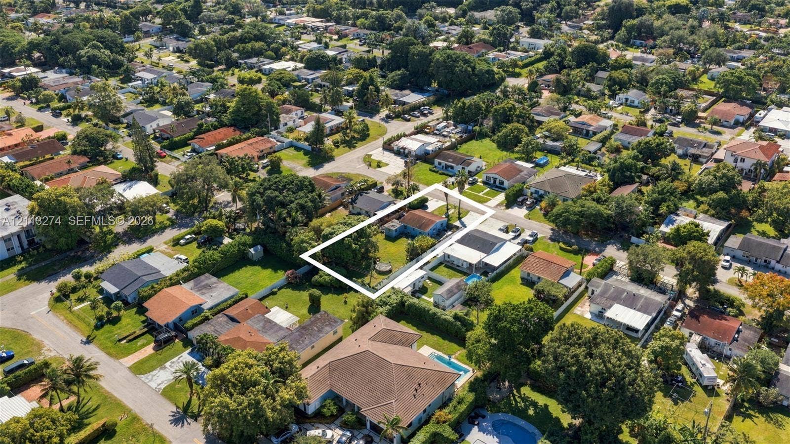 6521 SW 42nd Street, Miami, FL 33155 Aerial perspective featuring a rectangular lot, mature trees, and an established residential neighborhood