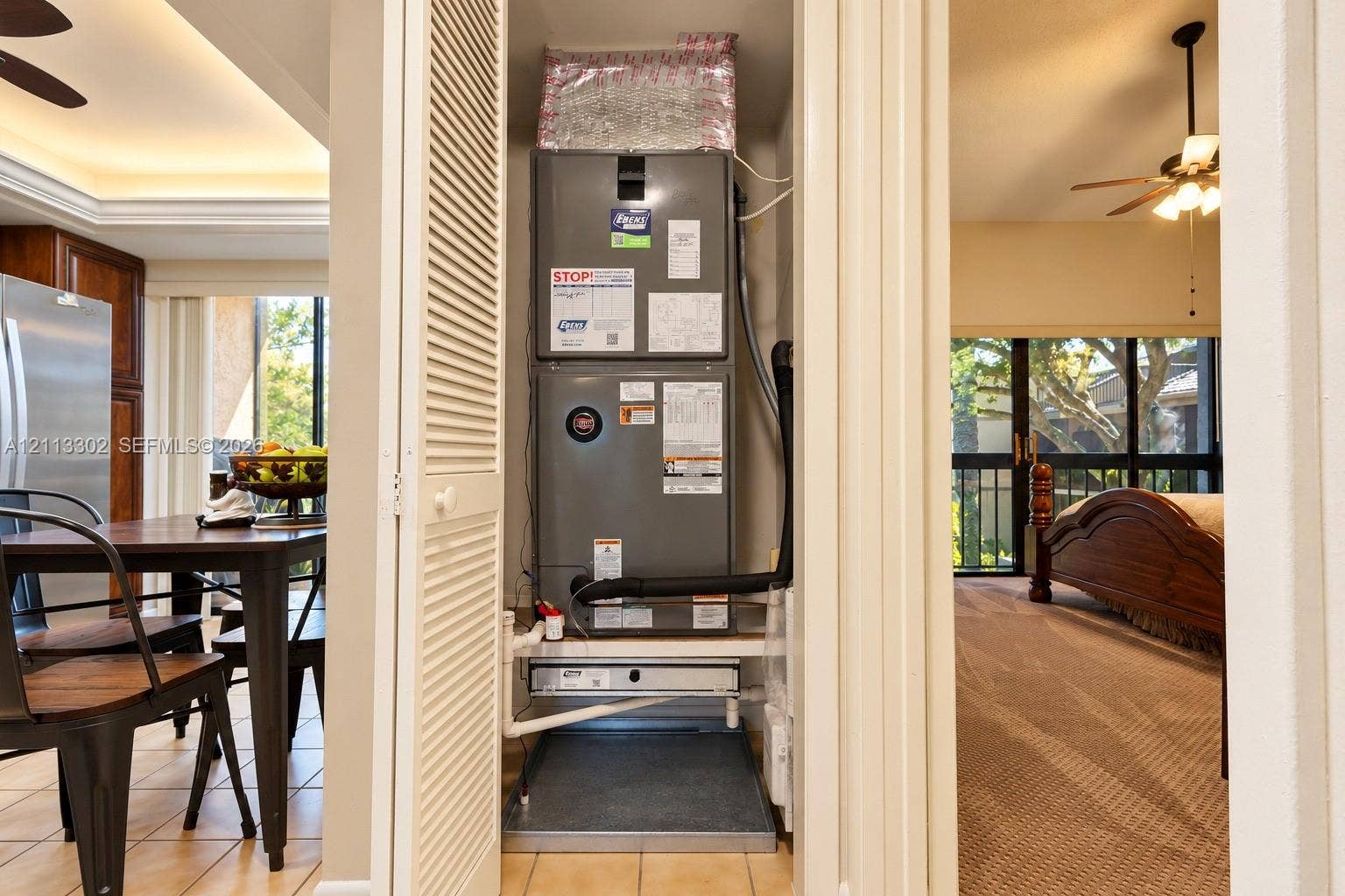 9450 Meadowood Drive, #202, Fort Pierce, FL 34951 Mechanical closet housing a high-efficiency HVAC system