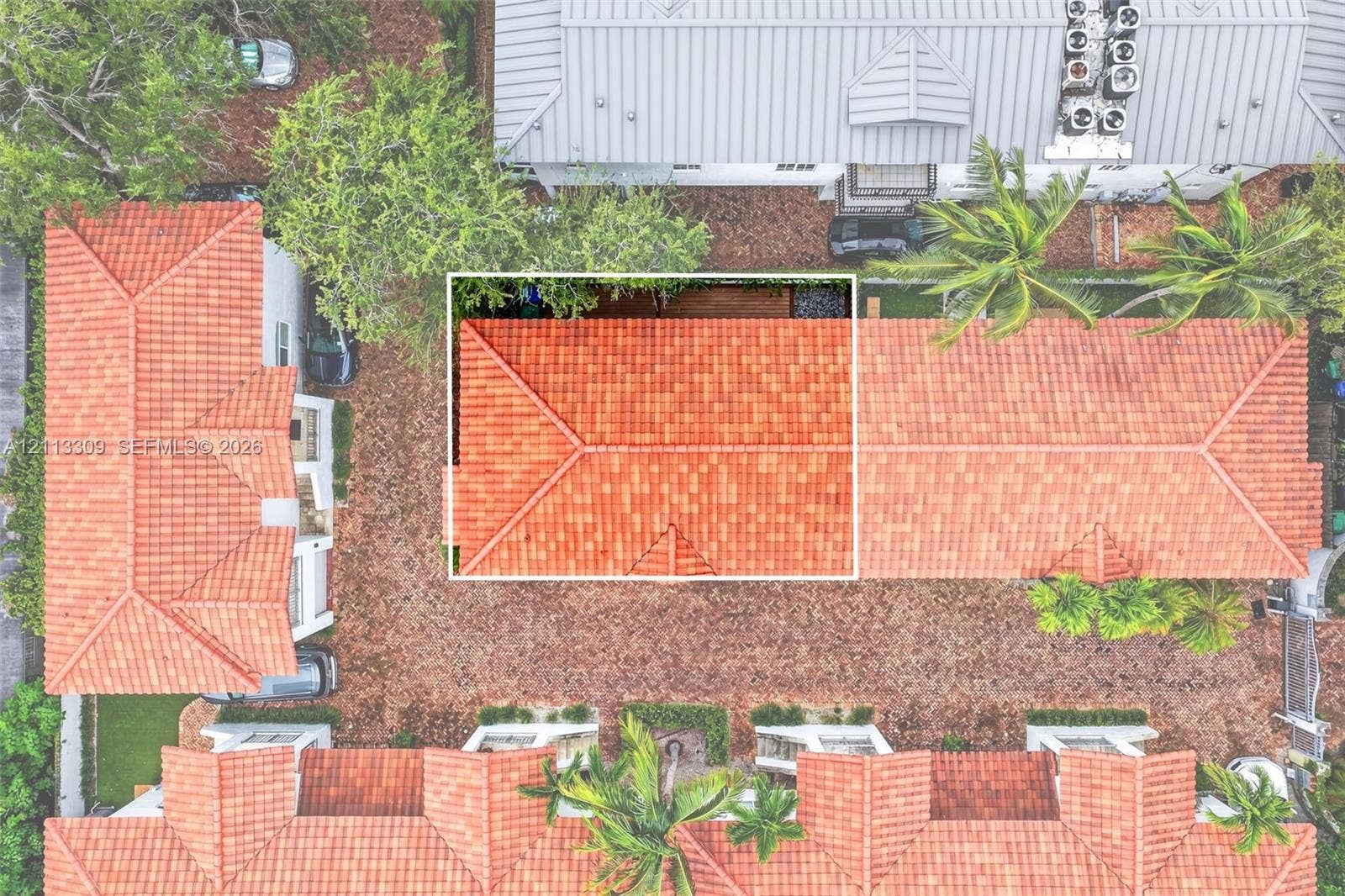 3082 Bird Avenue, #6, Miami, FL 33133 Aerial perspective featuring terracotta-style roof tiles and mature landscaping