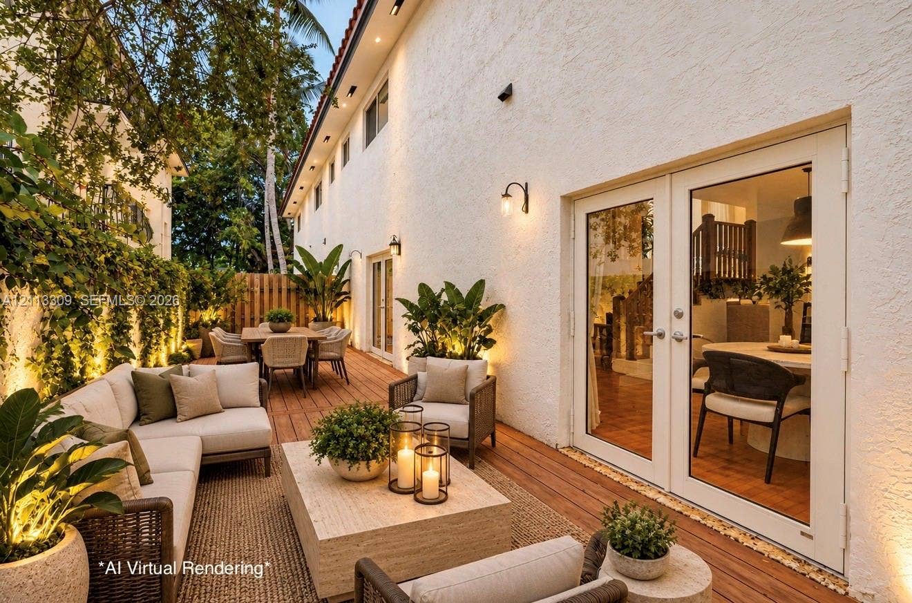 3082 Bird Avenue, #6, Miami, FL 33133 Exterior deck featuring wood-finish decking, smooth-finish stucco wall, and dual glass-panel patio doors