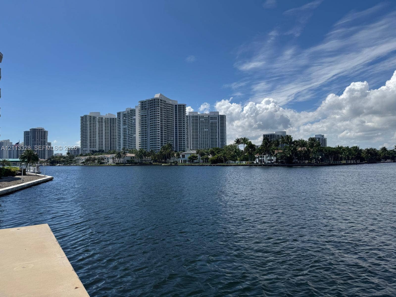 Hallandale Beach, FL 33009 Waterfront property featuring a concrete seawall and bulkhead