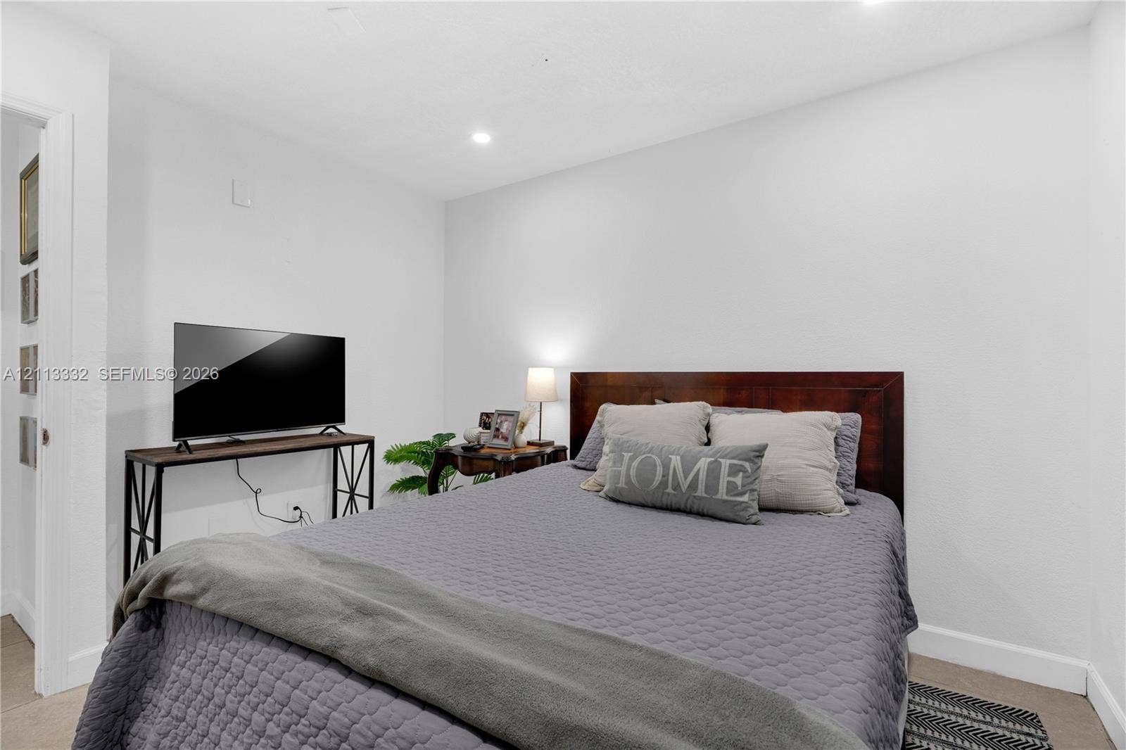 13111 SW 84th Street, Miami, FL 33183 Neutral interior room featuring recessed lighting, smooth wall finishes, and carpeted flooring