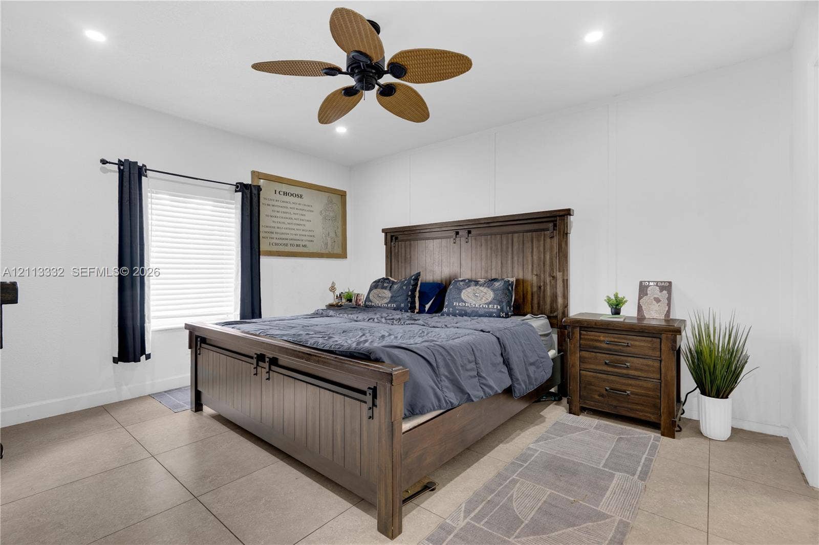 13111 SW 84th Street, Miami, FL 33183 Neutral-toned tile flooring, recessed ceiling lighting, and a multi-blade ceiling fan with wood-finish accents