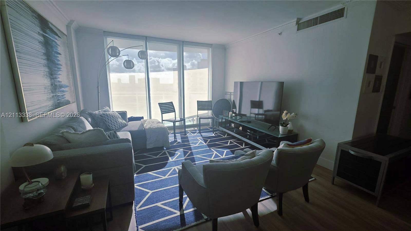 3001 S Ocean Drive, #1539, Hollywood, Hollywood, FL 33019 Floor-to-ceiling windows, wood-finish flooring, and crisp neutral wall finishes