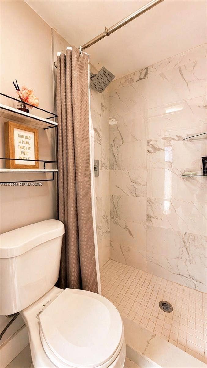 2425 SW 21st Terrace, #1, Miami, Miami, FL 33145 Full-height tiled shower surround, square rainfall showerhead, and integrated glass shelving