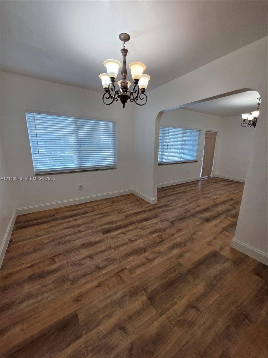 7207 Bay Drive, #2, Miami Beach, Miami Beach, FL 33141 Multi-light chandelier, and arched doorway