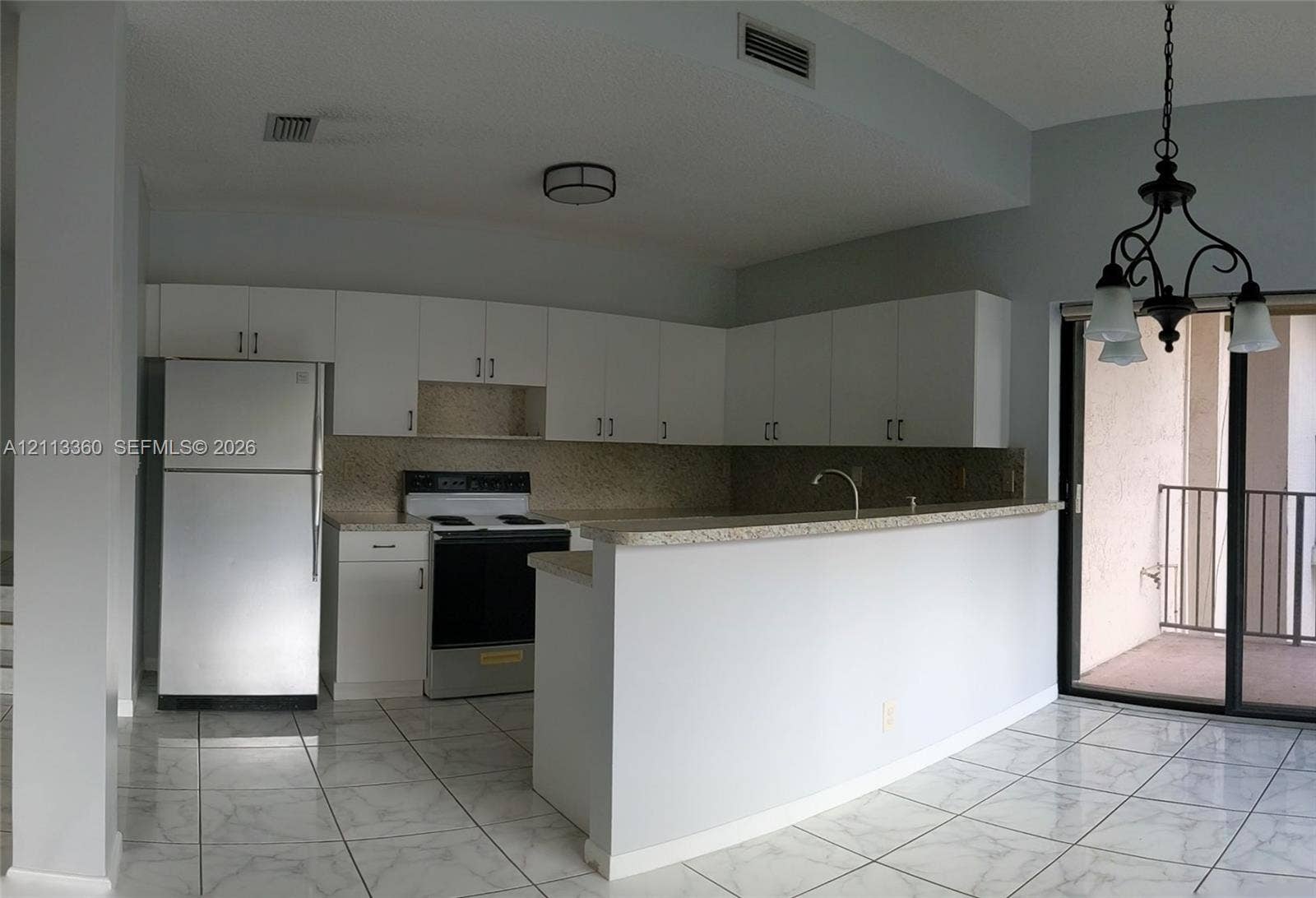 4720 SW 62nd Way, #303, Davie, Davie, FL 33314 Kitchen with breakfast bar.