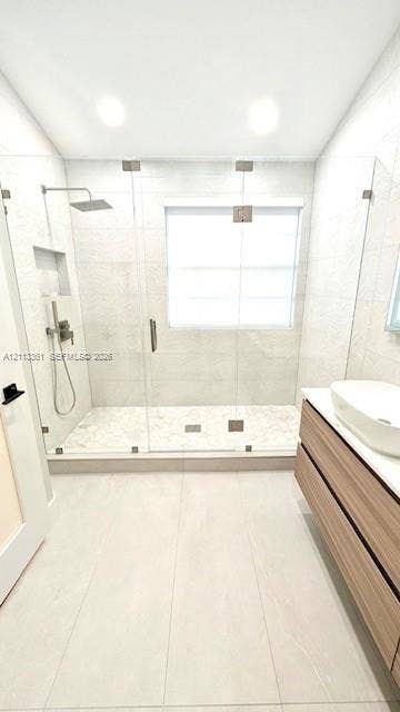 9395 Boca River Circle, Boca Raton, Boca Raton, FL 33434 High-ceiling interior featuring wood-finish flooring, a contemporary circular pendant light, and double doors with frosted glass panels