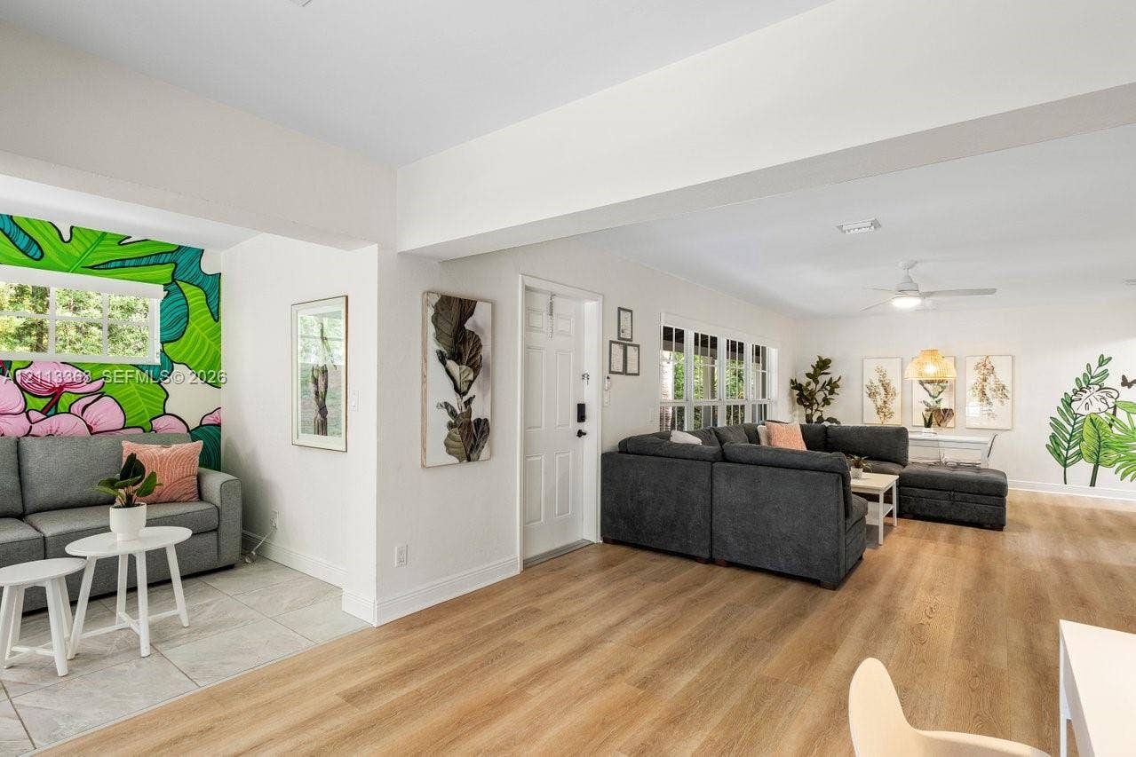 617 NE 9th Avenue, #72, Fort Lauderdale, Fort Lauderdale, FL 33304 Open-concept interior featuring light wood-finish flooring, recessed lighting, and multi-pane windows