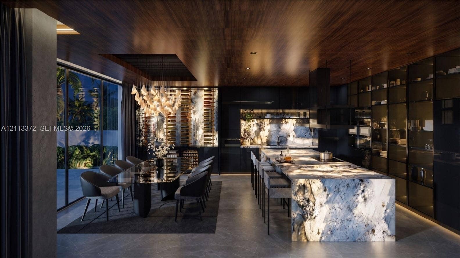 3312 NE 16th Court, Fort Lauderdale, FL 33305 Expansive kitchen featuring a large stone waterfall island, custom full-height glass cabinetry, recessed ceiling paneling with wood finish, and a built-in temperature-controlled wine display