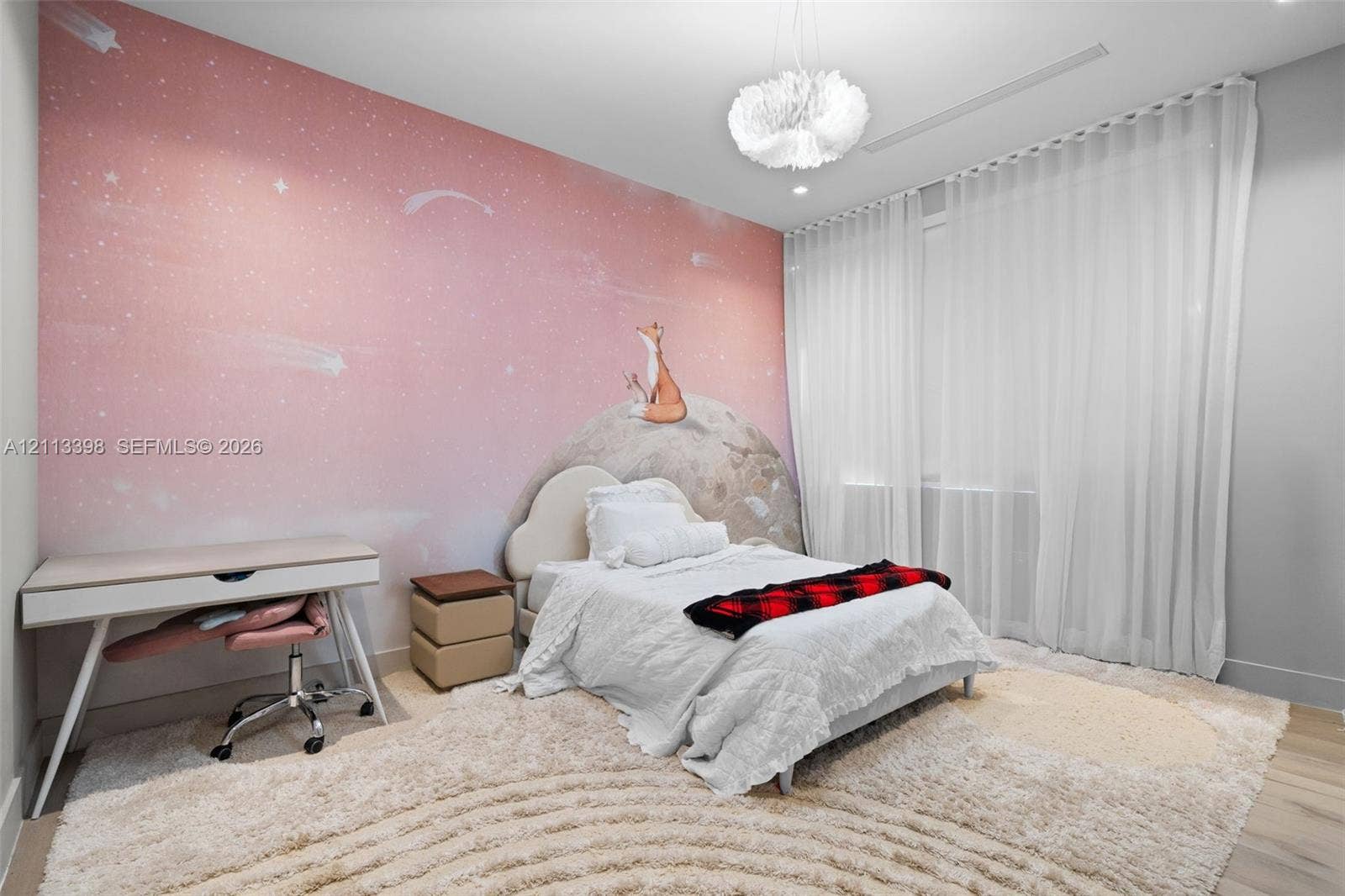 6814 NW 104th Court, #6814, Doral, Doral, FL 33178 Room featuring large-scale illustrated wall covering, neutral wood-finish flooring, floor-to-ceiling drapery, and a textured pendant light fixture
