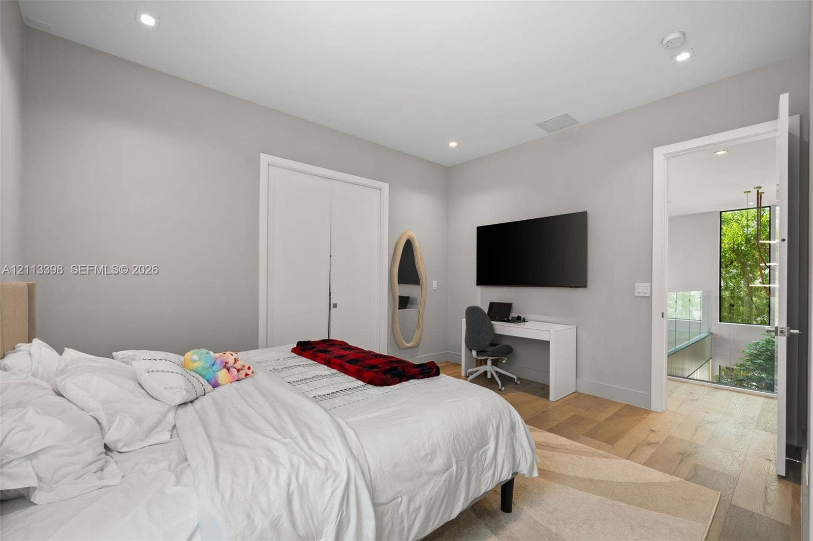 6814 NW 104th Court, #6814, Doral, Doral, FL 33178 Wood-finish flooring, recessed lighting, and dual-panel interior doors
