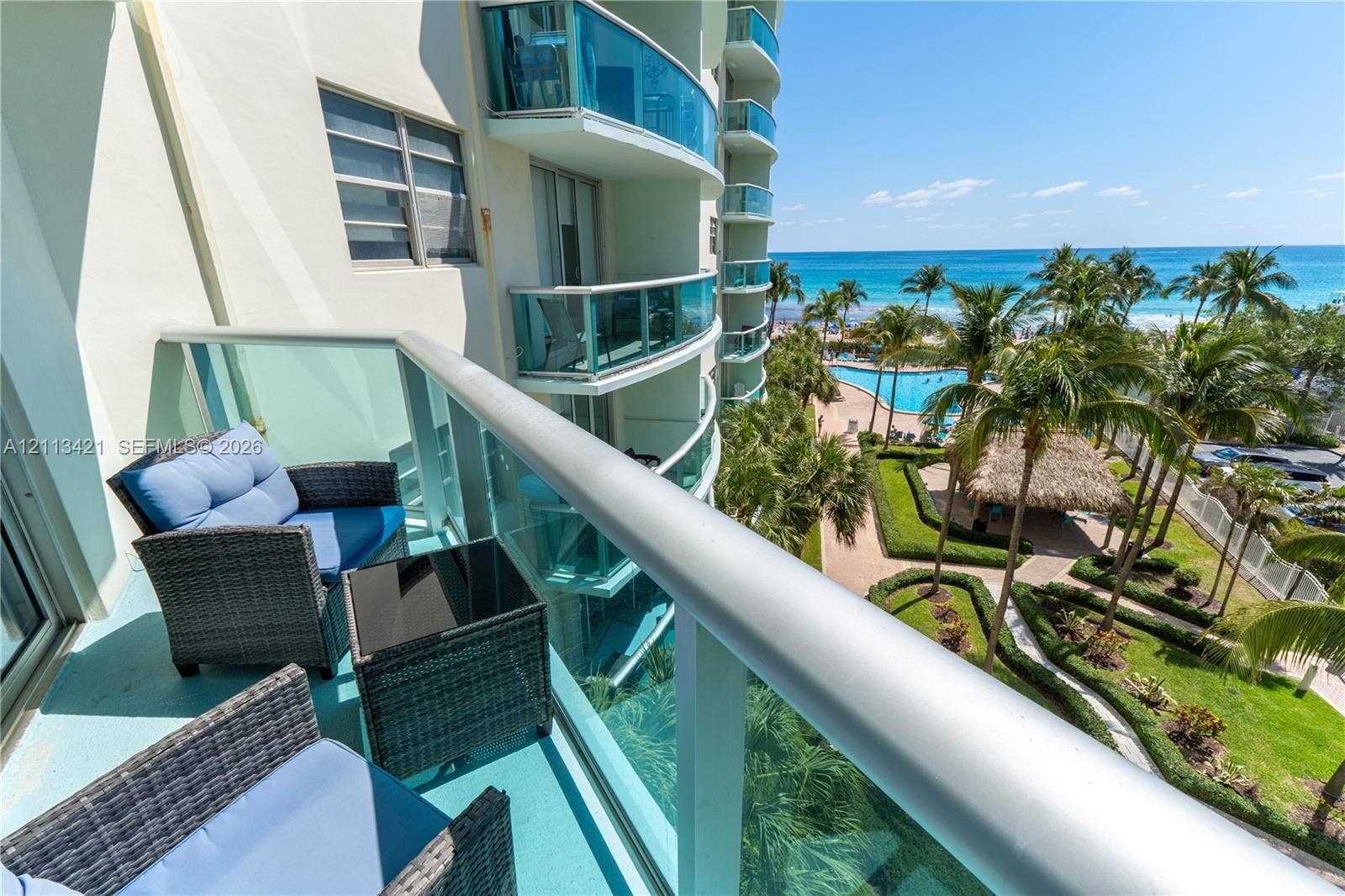 3901 S Ocean Drive, #5L, Hollywood, FL 33019 Private balcony with glass panel railing and ocean scenery