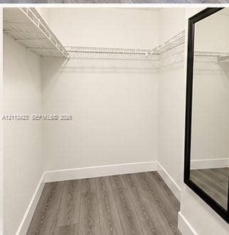 10360 SW 150th Court, #12207, Miami, Miami, FL 33196 Walk-in closet featuring wood-finish flooring and white wire shelving