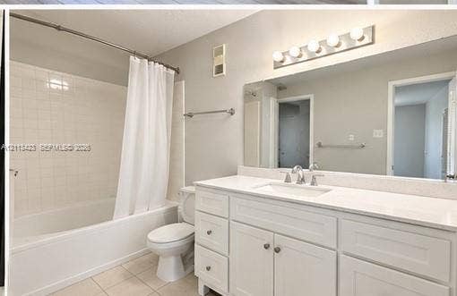 10360 SW 150th Court, #12207, Miami, Miami, FL 33196 Bathroom featuring a white vanity with an integrated countertop, large wall-mounted mirror, five-bulb vanity light, and a white tile tub surround