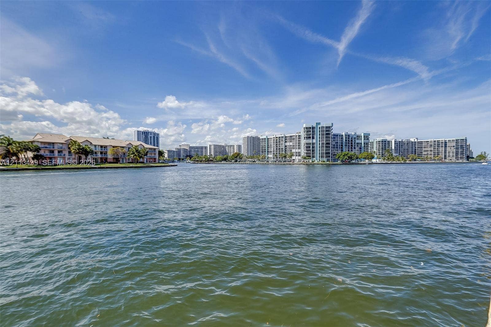 3800 S Ocean Drive, #416, Hollywood, FL 33019 Waterfront setting featuring expansive canal frontage and mid-rise coastal architecture