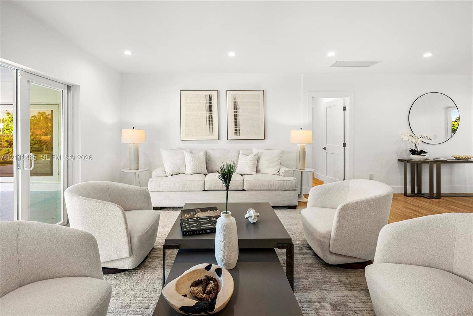 6951 SW 134th Street, Pinecrest, Pinecrest, FL 33156 Living area featuring wood-finish flooring, recessed lighting, and a sliding glass door