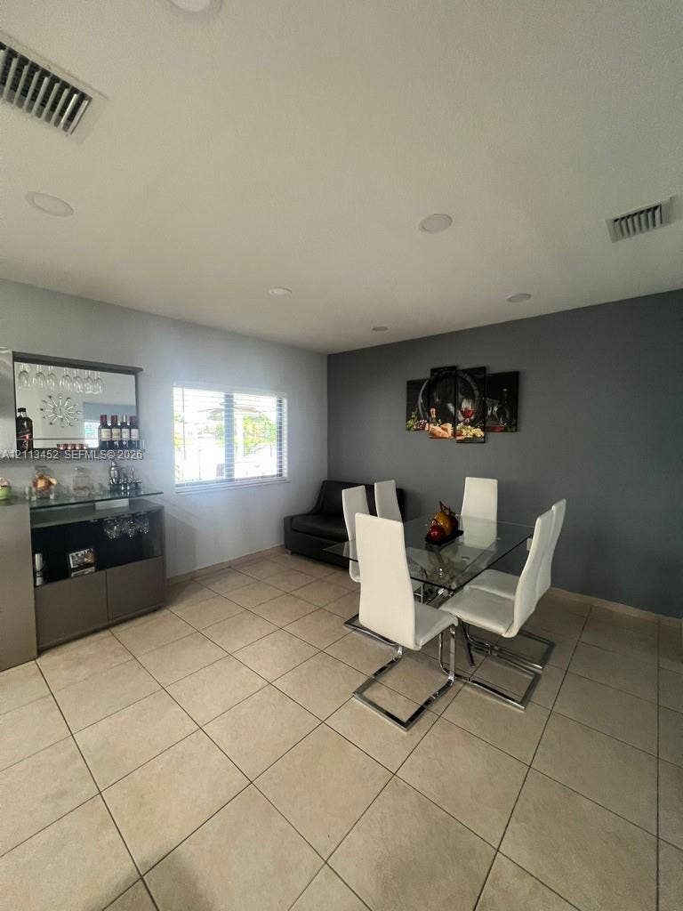 5083 SW 160th Avenue, Miami, Miami, FL 33185 Ceramic tile flooring, recessed lighting, and built-in cabinetry with integrated mirror