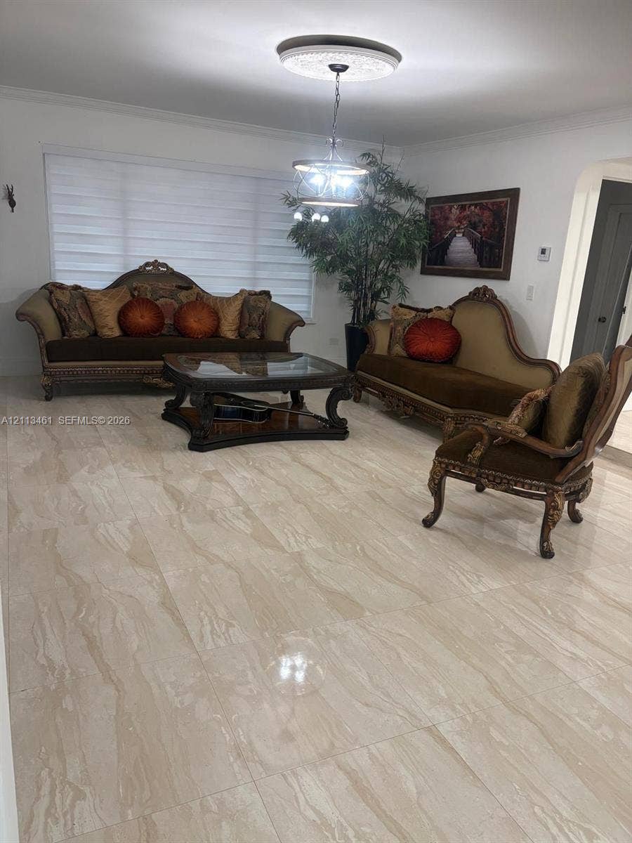 9961 SW 20th Street, Miami, Miami, FL 33165 Large-format polished stone flooring, recessed ceiling medallion, and multi-tier hanging light fixture