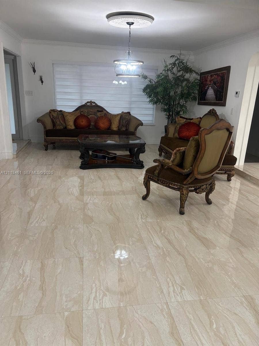 9961 SW 20th Street, Miami, Miami, FL 33165 Polished stone-finish tile flooring, decorative ceiling medallion, and custom pendant lighting fixture