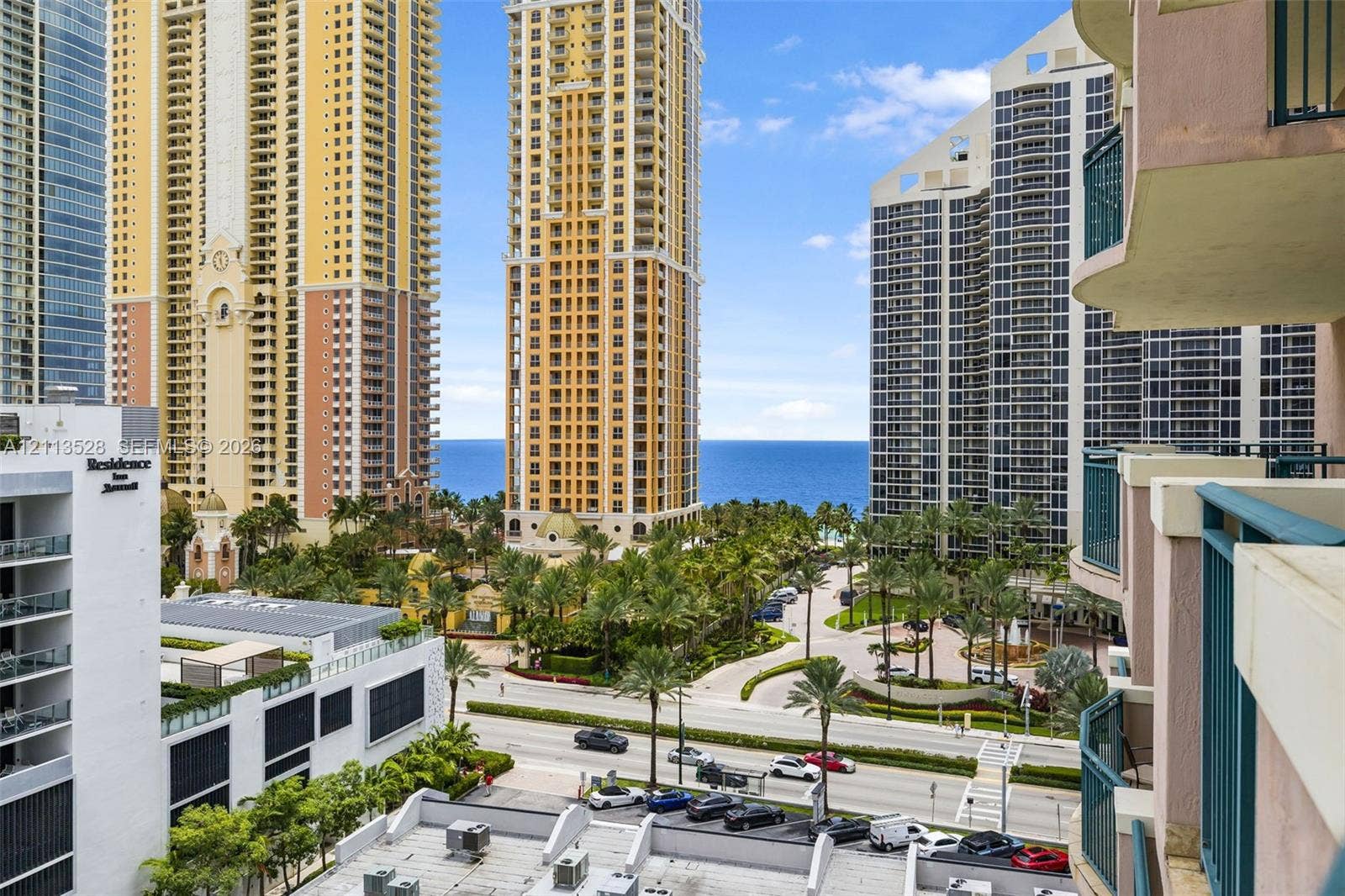 17555 Atlantic Boulevard, #1108, Sunny Isles Beach, Sunny Isles Beach, FL 33160 High-rise balcony featuring metal railings with ocean and skyline exposure