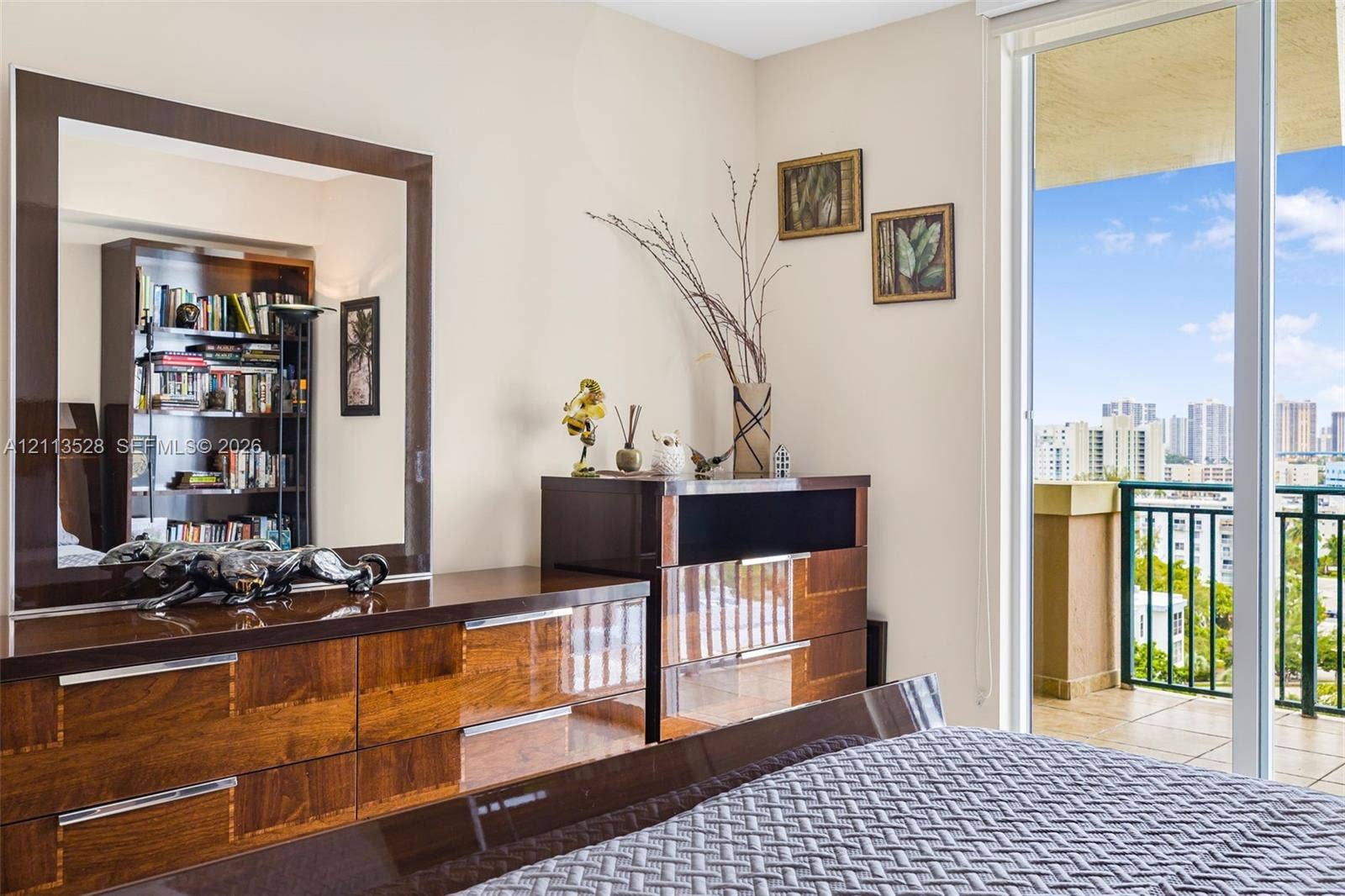 17555 Atlantic Boulevard, #1108, Sunny Isles Beach, Sunny Isles Beach, FL 33160 Floor-to-ceiling glass sliding door providing external access to a private balcony with metal railing