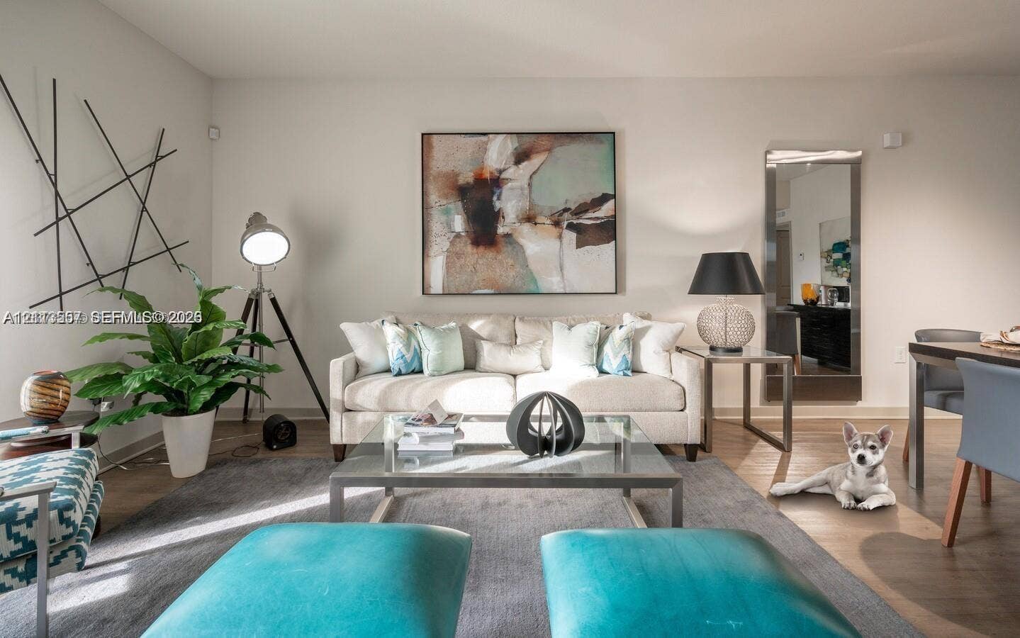 320 Franklin Club Drive, #Boca 1, Delray Beach, Delray Beach, FL 33483 Living area featuring neutral wall tones, full-length mirror, and wood-finish flooring