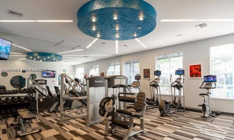 320 Franklin Club Drive, #Boynton, Delray Beach, Delray Beach, FL 33483 Fitness center featuring custom circular recessed ceiling lighting, wall-to-wall mirrors, patterned commercial carpeting, and large windows