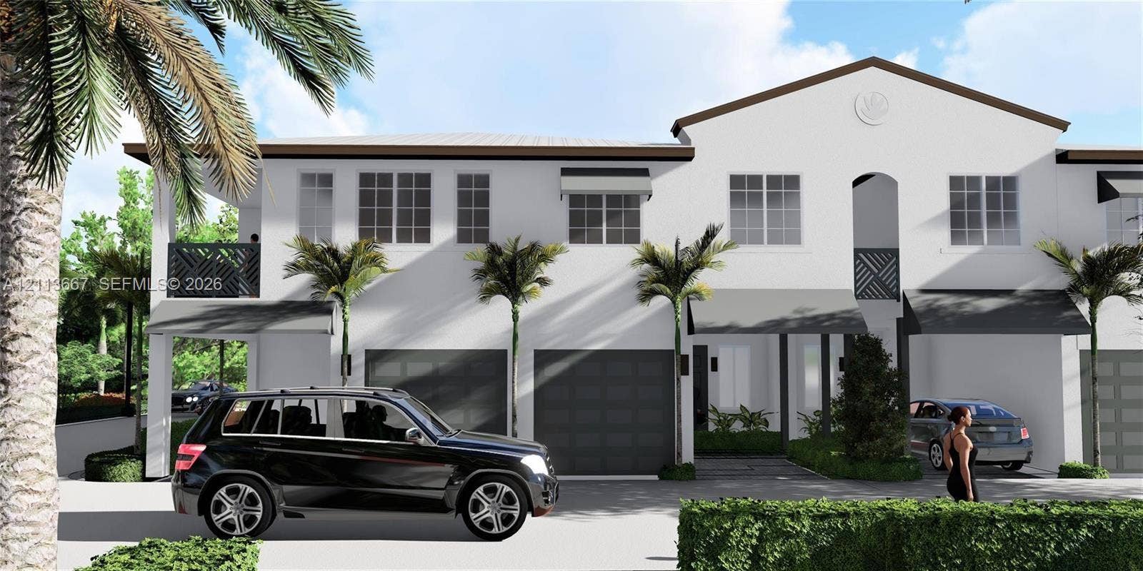 Two-story stucco exterior featuring covered balconies, multi-panel garage doors, and metal window awnings