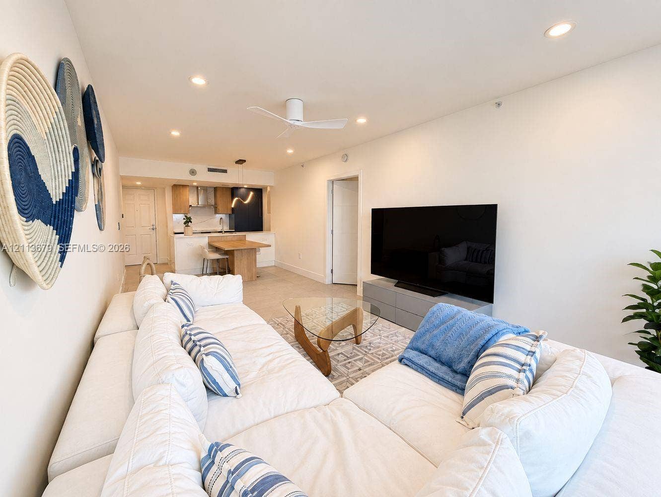 3020 NE 32nd Avenue, #612, Fort Lauderdale, Fort Lauderdale, FL 33308 Open-concept interior featuring recessed lighting, a modern ceiling fan, tile flooring, and built in dining area