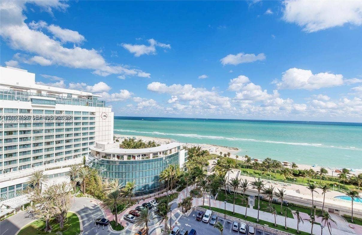 2899 Collins Avenue, #1429, Miami Beach, Miami Beach, FL 33140 Exterior perspective of a high-rise structure featuring glass-paneled balconies, floor-to-ceiling windows, and oceanfront exposure to the Atlantic coastline