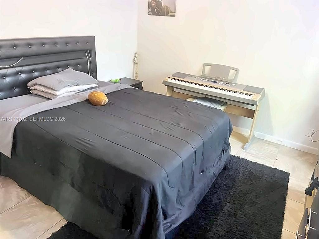 11530 NW 43rd, #1, Coral Springs, Coral Springs, FL 33065 Room featuring neutral wall finishes and large-format tile flooring