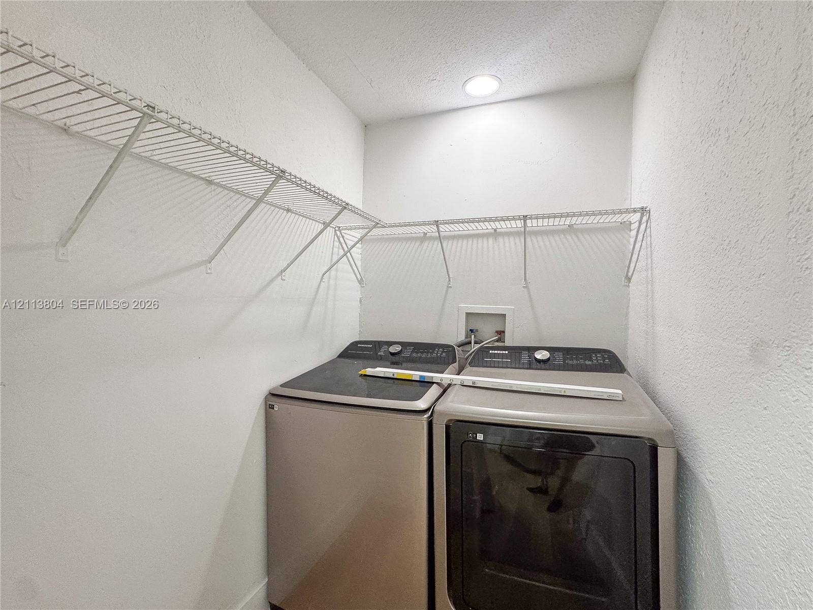 2300 NW 31st Avenue, Fort Lauderdale, FL 33311 Utility area featuring metal wire shelving and recessed ceiling lighting
