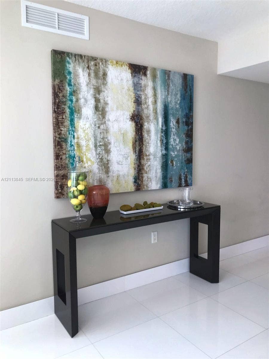 250 Sunny Isles Boulevard, #3-1506, Sunny Isles Beach, Sunny Isles Beach, FL 33160 Glossy white tiled flooring and neutral wall paint