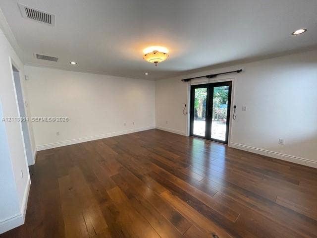 721 Tibidabo Avenue, #0, Coral Gables, Coral Gables, FL 33143 Wood-finish flooring, recessed lighting, central ceiling light fixture, and black-framed French doors