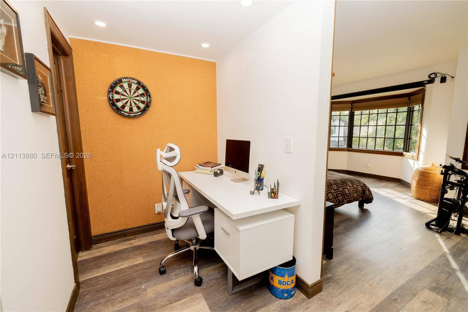 900 Coco Plum Way, Plantation, FL 33324 Built-in desk with integrated storage cabinetry, wood-finish flooring, recessed lighting, and a multi-pane bay window