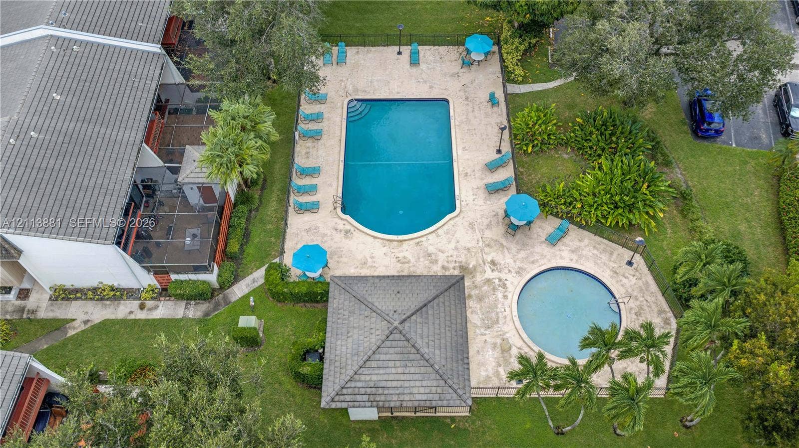 3886 Meadow Lane, #250, Hollywood, FL 33021 Outdoor recreation area featuring a swimming pool, circular wading pool, stone-finish deck, and covered pavilion
